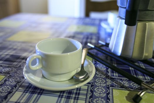 white Cofee cup in a wooden table