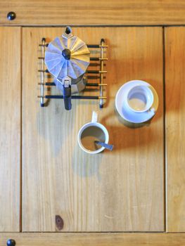 white Cofee cup in a wooden table