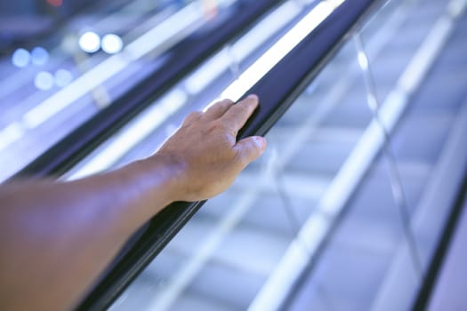 arm in a automatic escalator in a mall