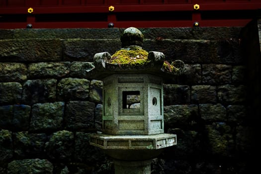 Mossy stone lantern with close-up detailed view