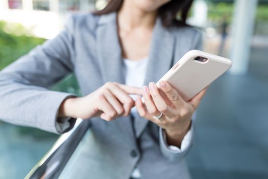 Businesswoman use of mobile phone