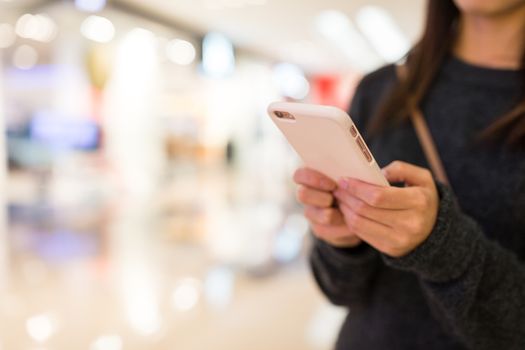 Woman working on cellphone