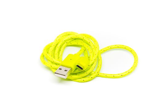 Portable micro USB charger for phone on white background ideal for travel item.