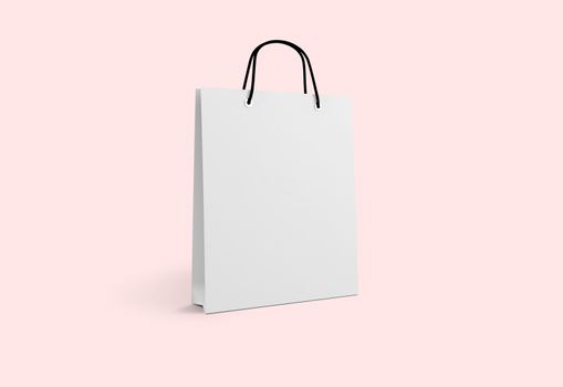 white paper bag for shopping on a pink background