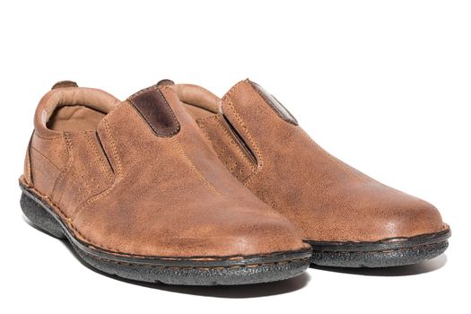 Brown men's shoes on white background, isolated, studio