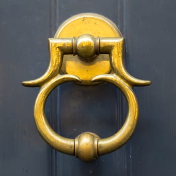 Close up of rustic old door in Florence, Italy.