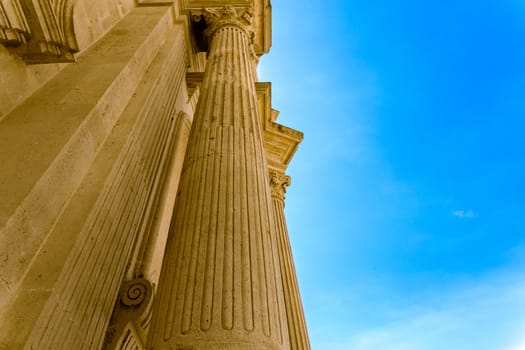 Detail of a italian baroque church on blue sky