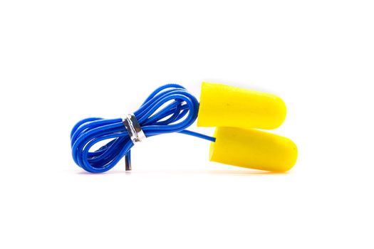 Yellow earplugs with blue band on white background.