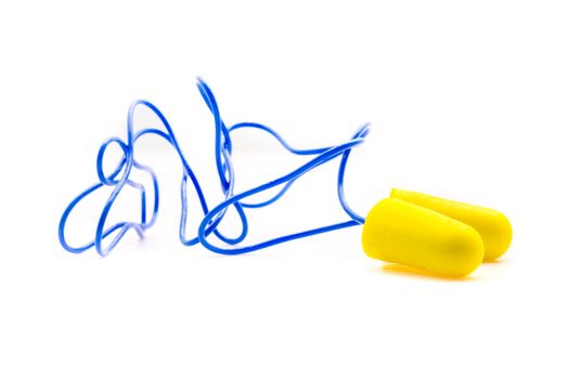 Yellow earplugs with blue band on white background.