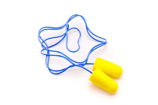 Yellow earplugs with blue band on white background.