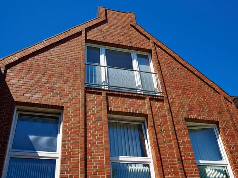 Modern design condominium apartment home made from red bricks  