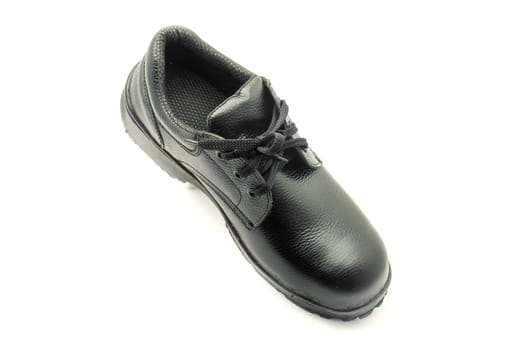 Protective workwear black safety shoes on white background.