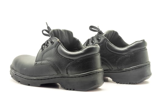 Protective workwear black safety shoes on white background.