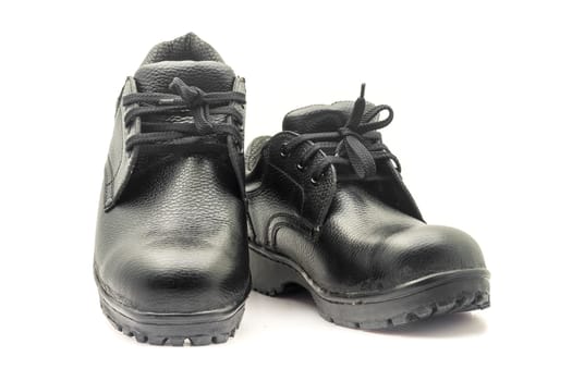 Protective workwear black safety shoes on white background.