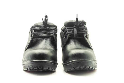 Protective workwear black safety shoes on white background.