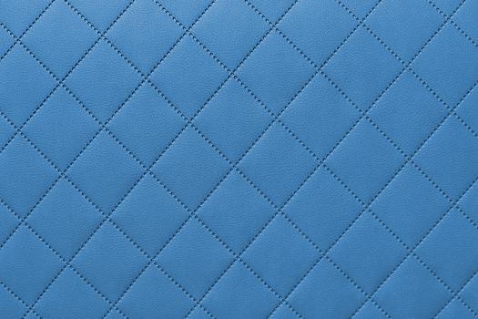 detail of sewn leather, blue leather upholstery background pattern