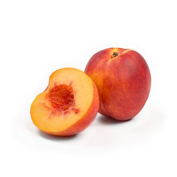 Ripe peach fruit isolated on white background cutout.