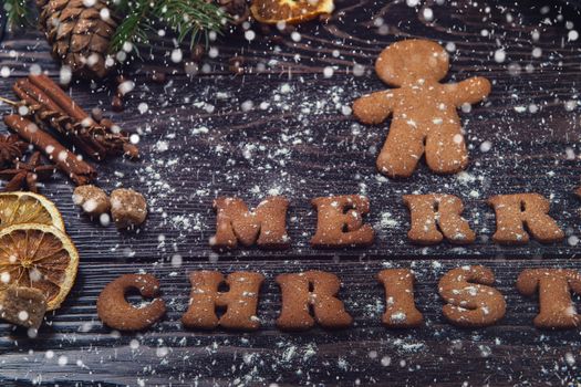 Gingerbreads for christmas on wooden background