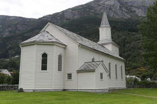 The old white church with tower in Odda