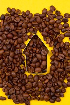 up arrow of coffee beans on the yellow background