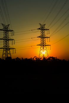 High voltage power tower at sunset in Brisbane, Queensland.
