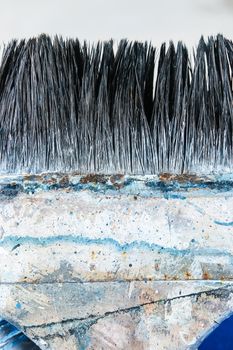 Close up of old paint brushes, grunge and rusty texture background