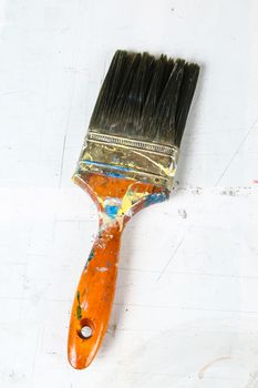 Close up of old paint brushes, grunge and rusty texture background