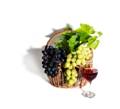 Grapes, red wine and vine isolated on white