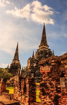 View of asian religious architecture ancient Pagodas in Wat Phra Sri Sanphet Historical Park, Ayuthaya province, Thailand, Southeast Asia. Thailand's top historic landmark, attraction and destination