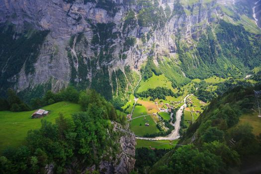 Stunning Lauterbrunnen valley rural view, bird eye view from cable car from Stechelberg to Murren Station, Lauterbrunnen, Bernese Oberland, Switzerland, Europe.
