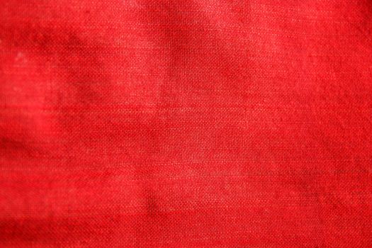 Close-up red traditional fabric cloth texture, textile detail background