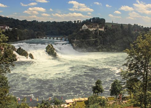 Panorama view of Rhine Falls with Castle Laufen. Rhine Falls is the biggest plain waterfall in Europe, Neuhausen, Switzerland