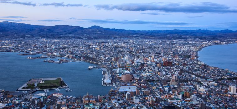 Beautiful Sunset View from Mt Hakodate, Hakodate city with bay and harbour on the peninsula with sea on both sides. Hakodate, Hokkaido, Japan.