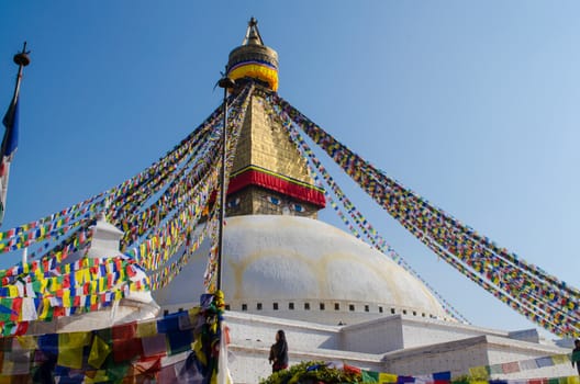 the famous buuha eye gazing out sleepily from each side of the tower are those of the all seeing primordial buddha.perched a top a hill on the western edge of the kathmandu valley.