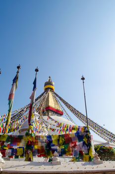 the famous buuha eye gazing out sleepily from each side of the tower are those of the all seeing primordial buddha.perched a top a hill on the western edge of the kathmandu valley.