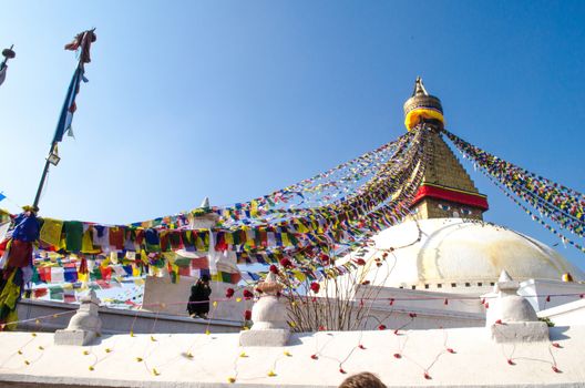 the famous buuha eye gazing out sleepily from each side of the tower are those of the all seeing primordial buddha.perched a top a hill on the western edge of the kathmandu valley.
