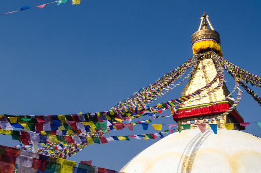 the famous buuha eye gazing out sleepily from each side of the tower are those of the all seeing primordial buddha.perched a top a hill on the western edge of the kathmandu valley.