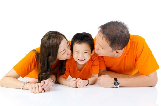 Indoor portrait of asian family at home