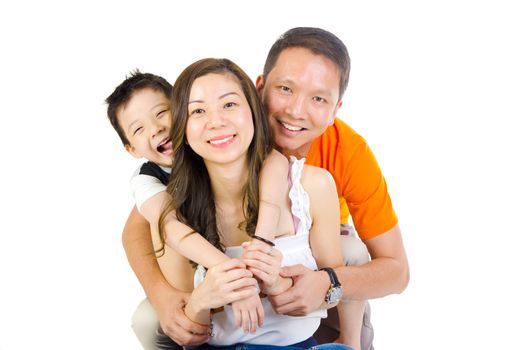 Indoor portrait of a happy asian family