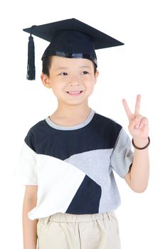 Happy and very glad asian school kid graduate with graduation cap isolated on white background