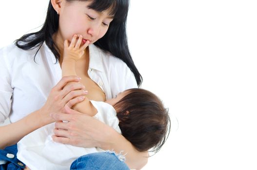 Asian mother breastfeeding her cute baby girl