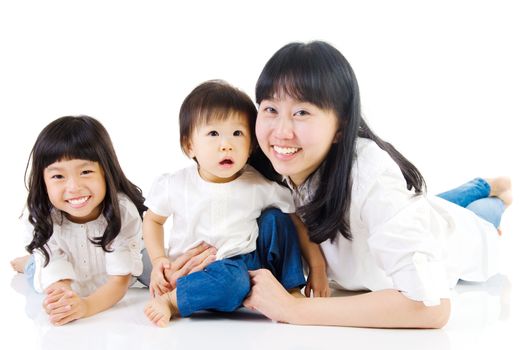 Asian mother and her daughters indoor portrait