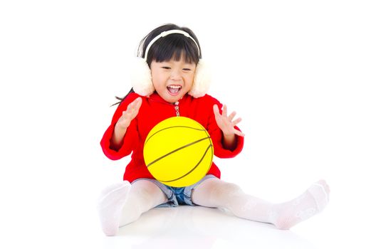 Portrait of a lovely asian girl playing on the studio