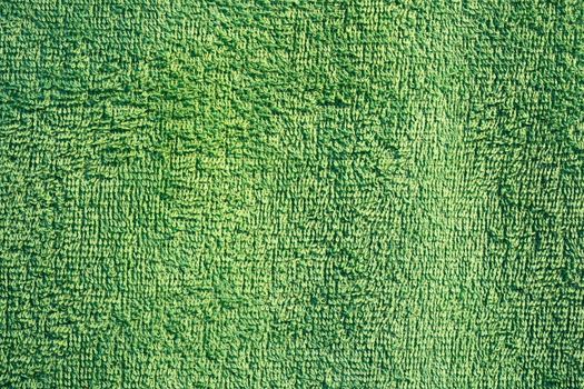 green texture of a fluffy towel