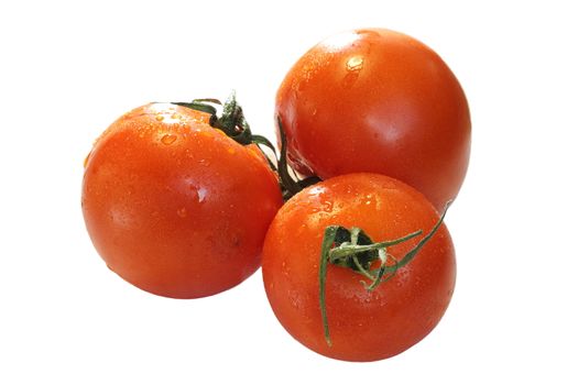 three fresh tomatoes isolated over white background