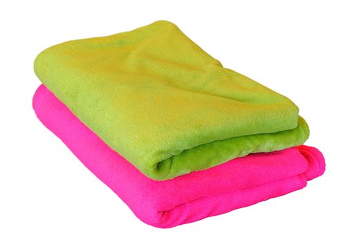 two blankets isolated over white background, green and pink
