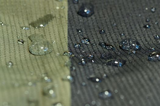 detail of  water repel textile material, green and black, shallow depth of field