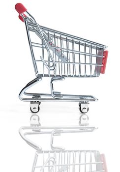 Shopping cart over a white background