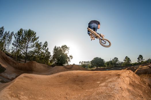 Bmx Table Top on a dirt track.