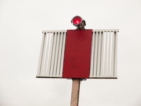 a marine seaside red and white light metal thing in sky; England; UK